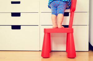 Kids,Safety,Concept-,Little,Girl,Climbing,On,Baby,Chair